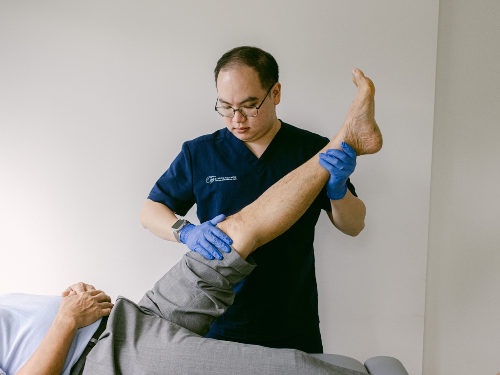 Podiatrist Assessing Knee Osteoarthritis